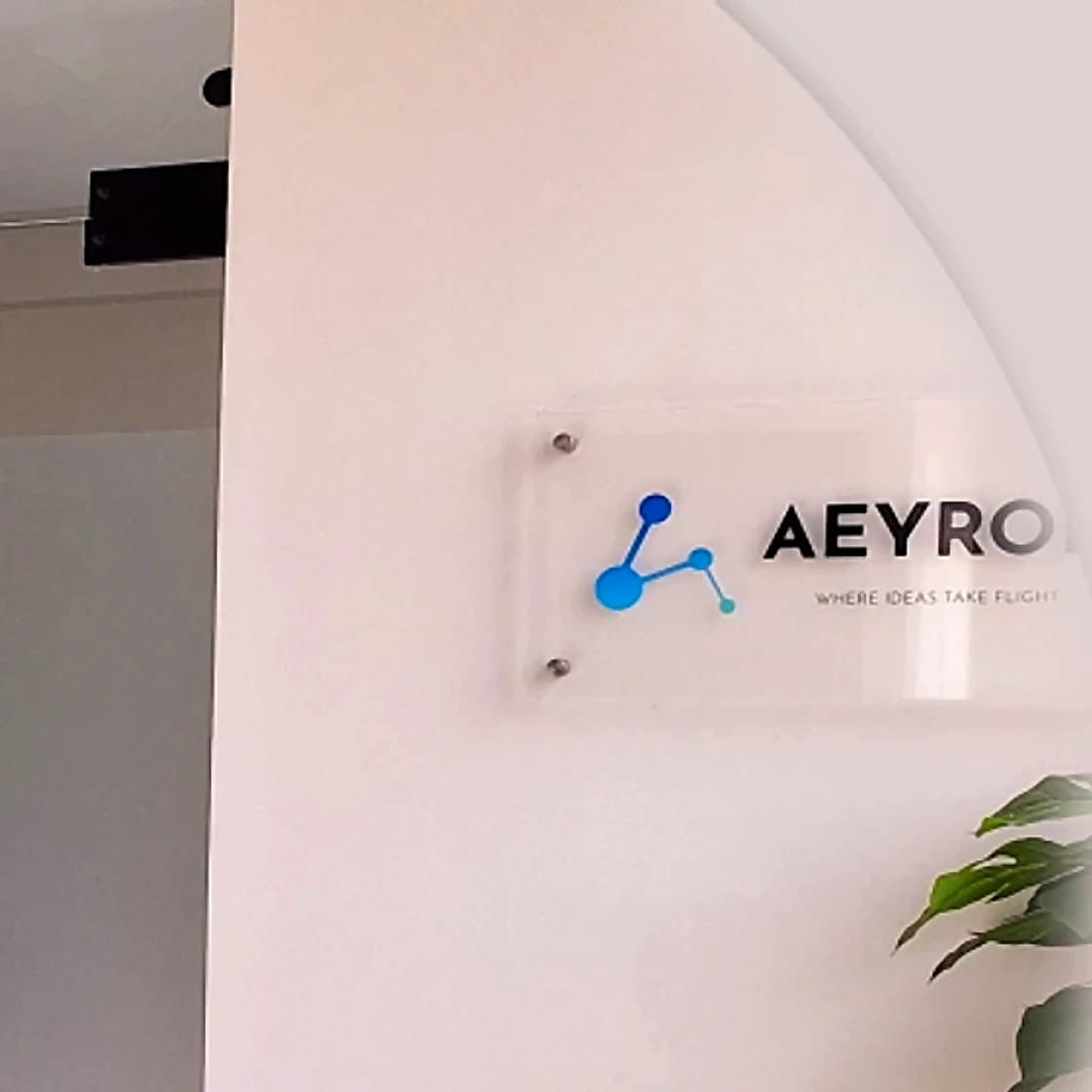 Aeyron sign at the office entrance