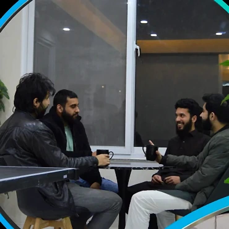 Aeyron team members in a discussion